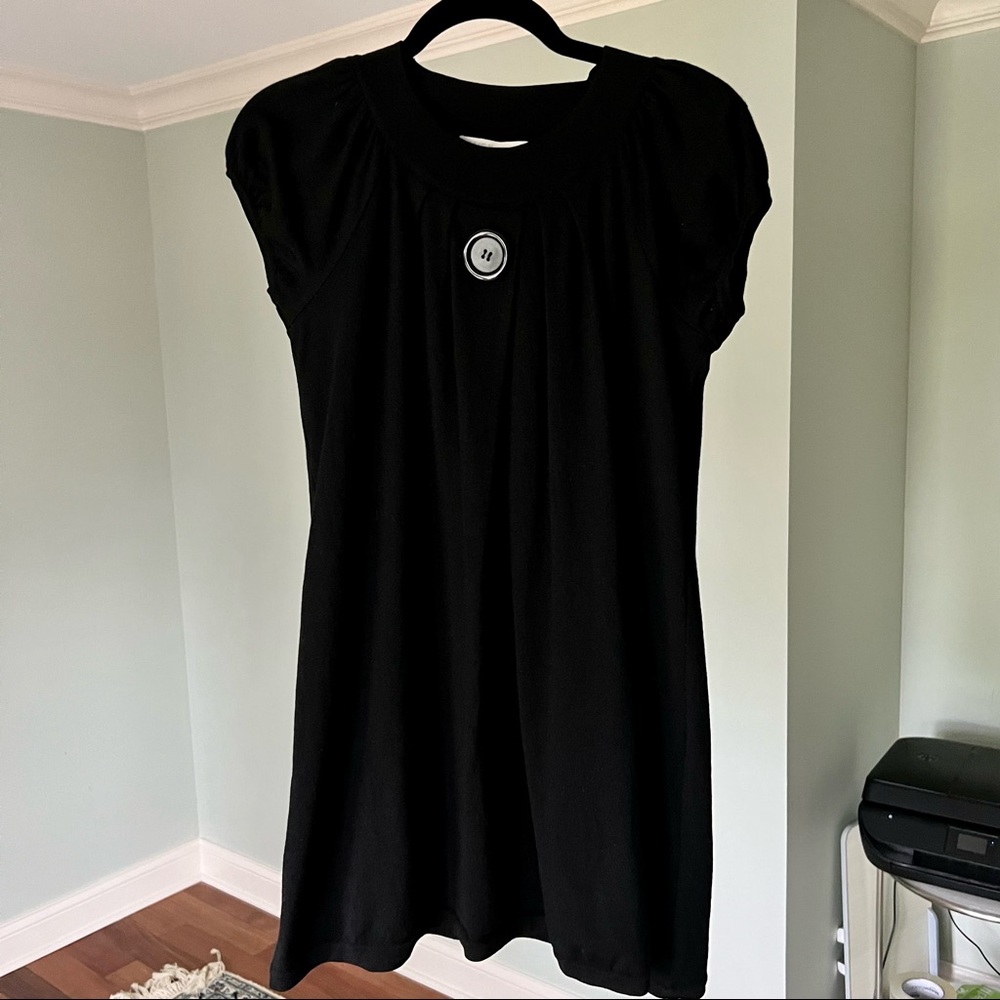 Design history Size M button tunic